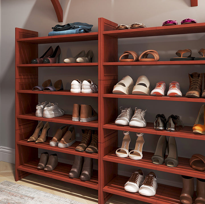two 3 tiered John Louis Home stackable shoe and shelving racks used to store shoes in a closet